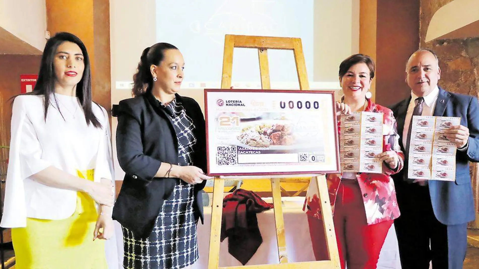 Presentación de billete de lotería con imagen de asado de boda